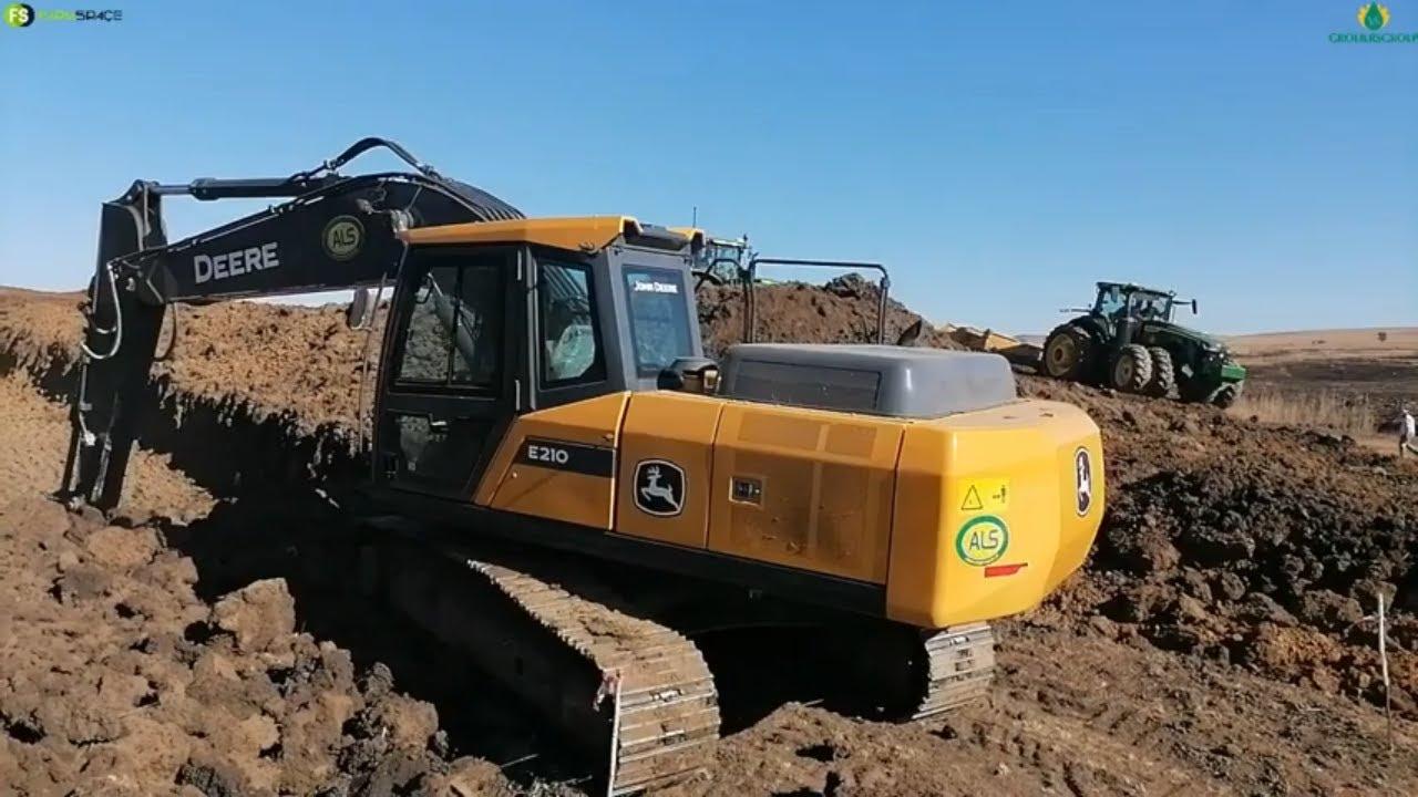 2022 John Deere 210 excavator op die VS Groeiersgroep Veiling, 20 Aug 2022.