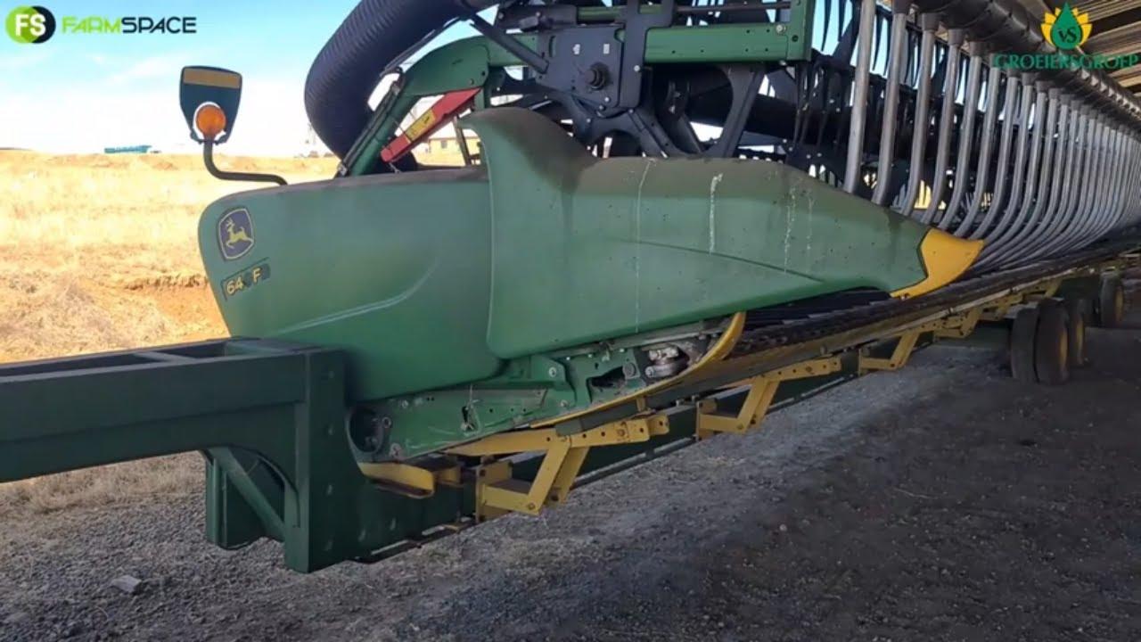2017 John Deere 640F Hydraflex Draper tafel (1) met AWS op die VS Groeiersgroep Veiling 20 Aug 2022