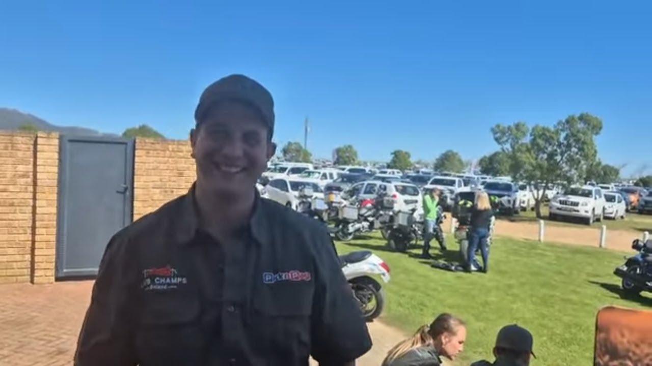 Wat is die waarde wat Lamb Champs Boland tot die waardeketting toevoeg?